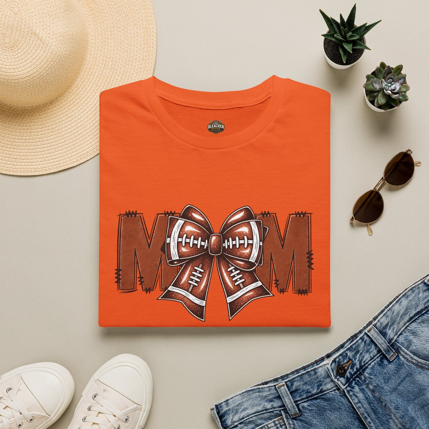 Football Mom T-Shirt — 'MOM' with Football Bow Graphic